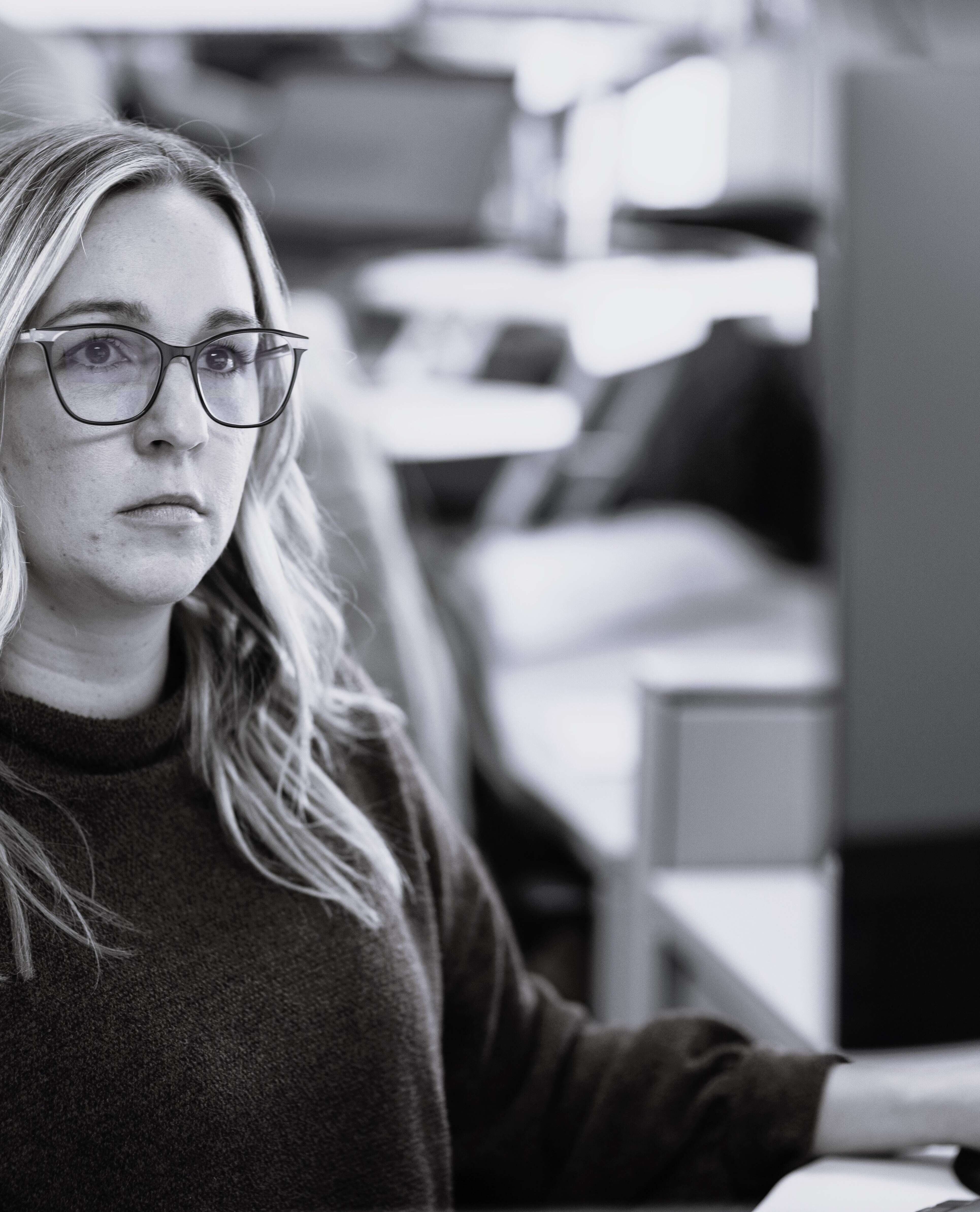 woman working at computer monitor 