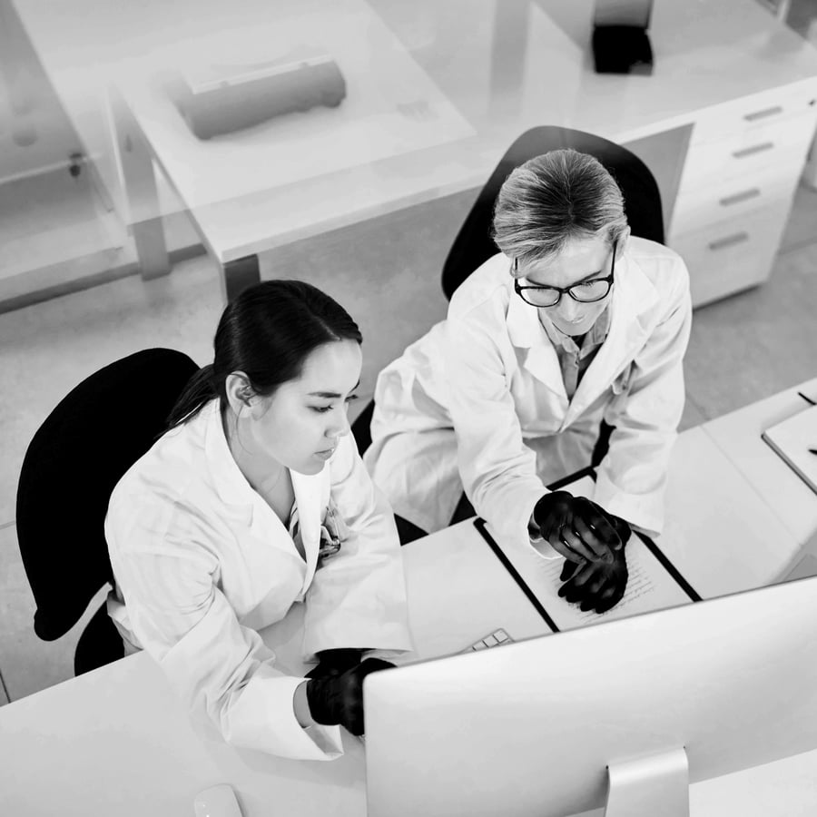 shot-of-two-scientists-working-together-on-a-compu-2023-11-27-05-26-17-utc-BW 1to1