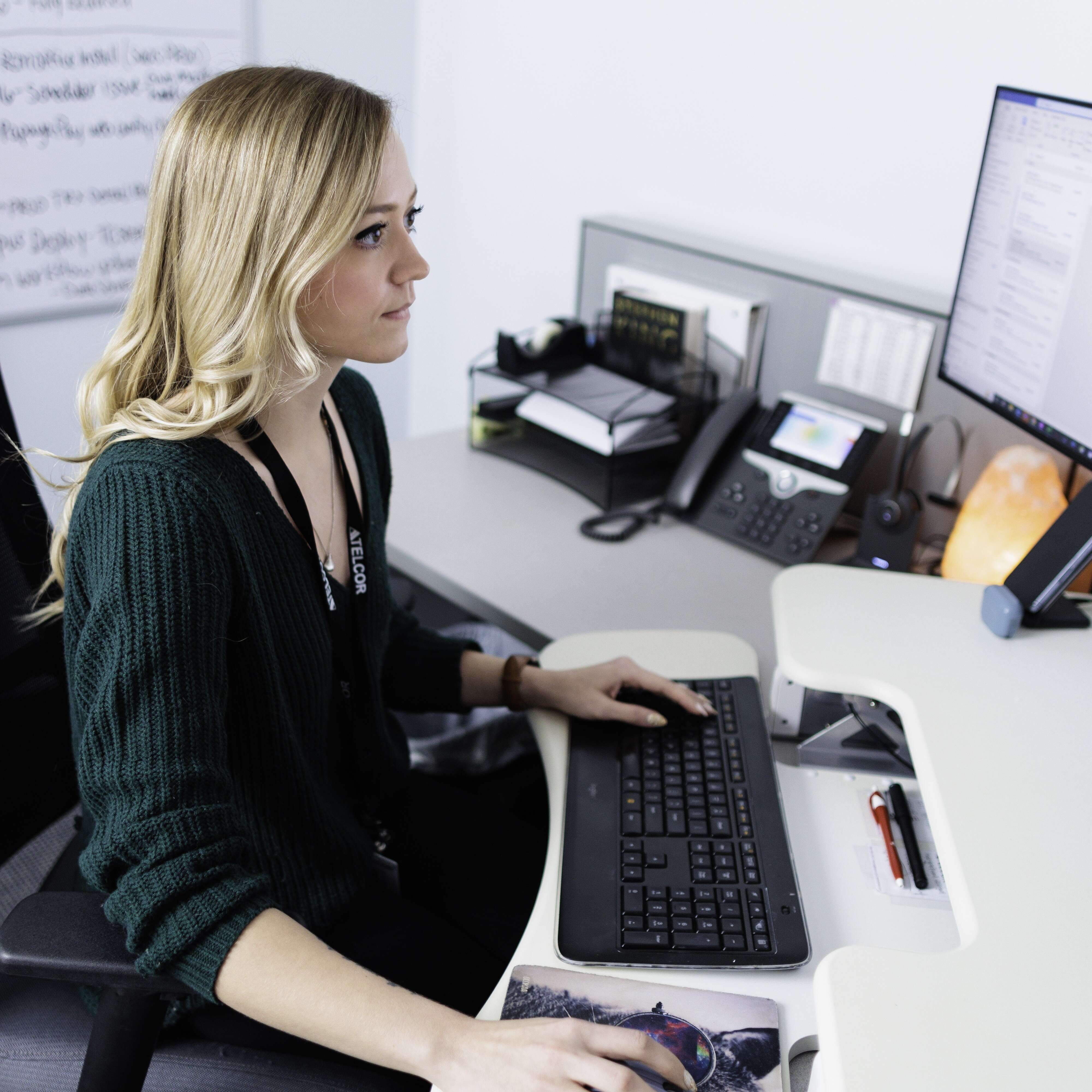 woman working at computer monitor